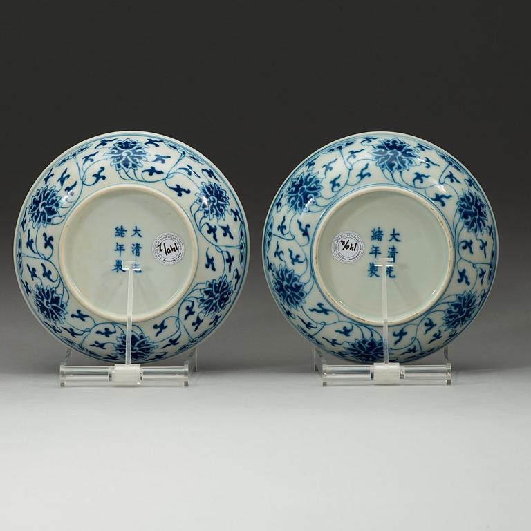 A pair of blue and white lotus dishes, Qing dynasty, Guangxu (1874-1908) marks and of period.