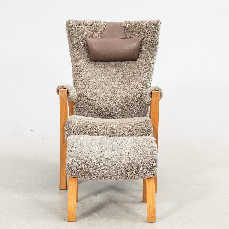 Armchair with footstool, "Focus", Bröderna Andersson, 21st century.