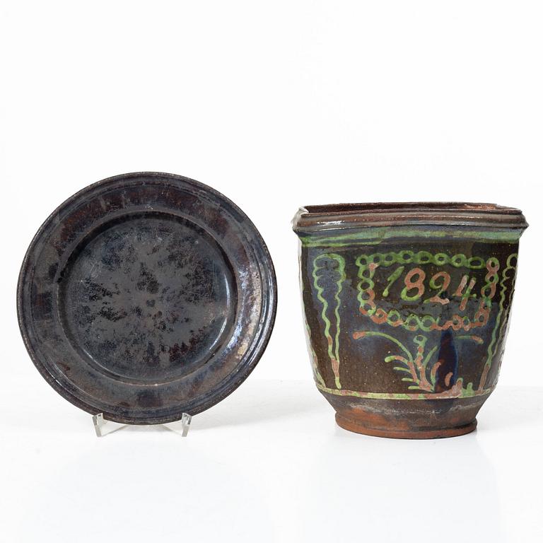 Stoneware planter and stand, dated 1824.