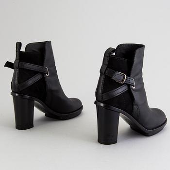 A pair of Acne boots, size 40.