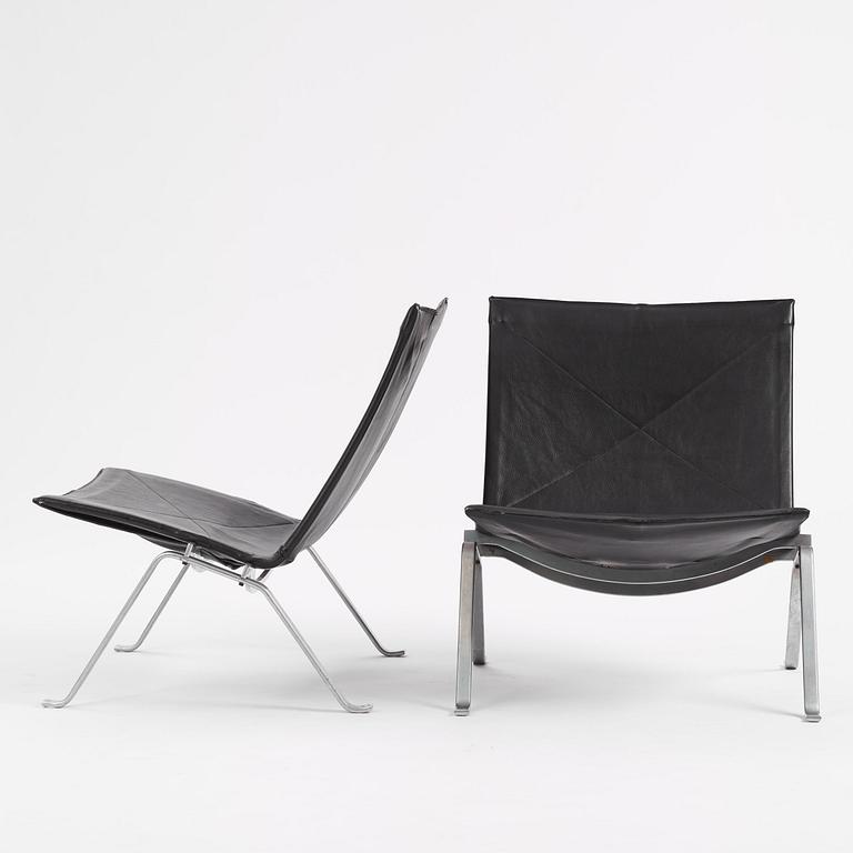 Poul Kjaerholm, a pair of black leather "PK22" lounge chairs, E. Kold Christensen, Denmark.
