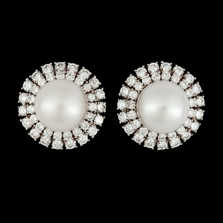 A pair of cultured pearl and brilliant cut diamond earrings, tot. 3.57 cts.