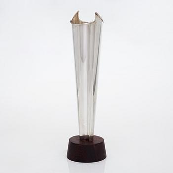 Tapio Wirkkala, a 'Liekki' (Flame) silver vase on a rosewood base, model TW 228,  Kultakeskus, Hämeenlinna 1962.