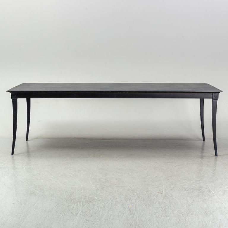 A metal Restoration Hardwood table, 21st Century.