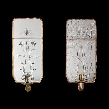 640. A pair of Swedish 18th century one-light girandole mirrors by E. Göbel.