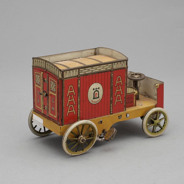 CHOKLADAUTOMAT samt LEKSAKSBIL, plåt,  Tyskland, bl a Lehmann, 1900-talets första hälft.
