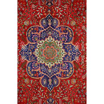 A Tabriz carpet, 400 x 300 cm.