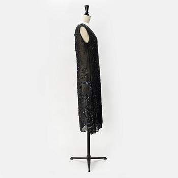 A pearl and sequin embroidered 1920's dress.