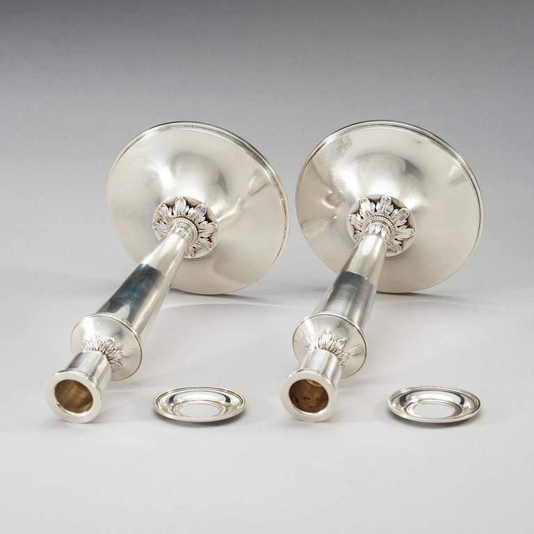 A pair of Atelier Borgila sterling candlestick,