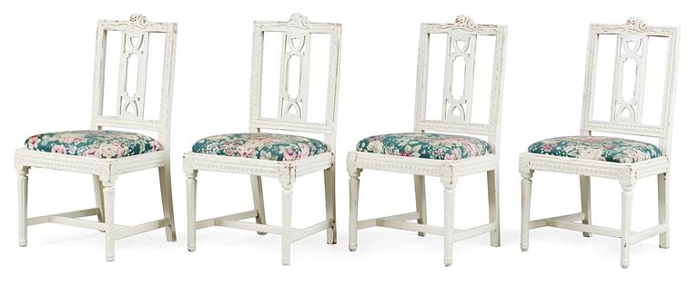 Four Gustavian chairs.
