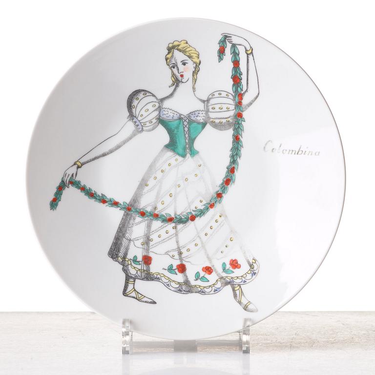 Piero Fornasetti, a set of 12 "Maschere Italiane" porcelain plates, Milan, Italy.