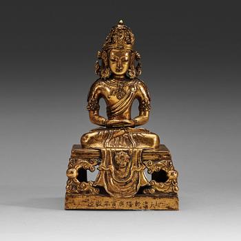 4. A gilt copper alloy figure of Amitayus, Qing dynasty, Qianlong (1736-95).