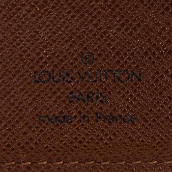 LOMPAKKO, Louis Vuitton.