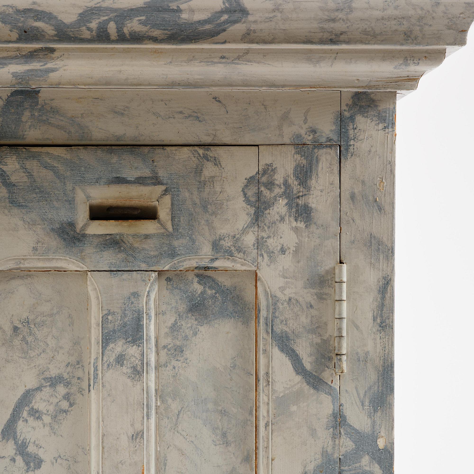 A Swedish column-shaped cabinet late 19 th century.