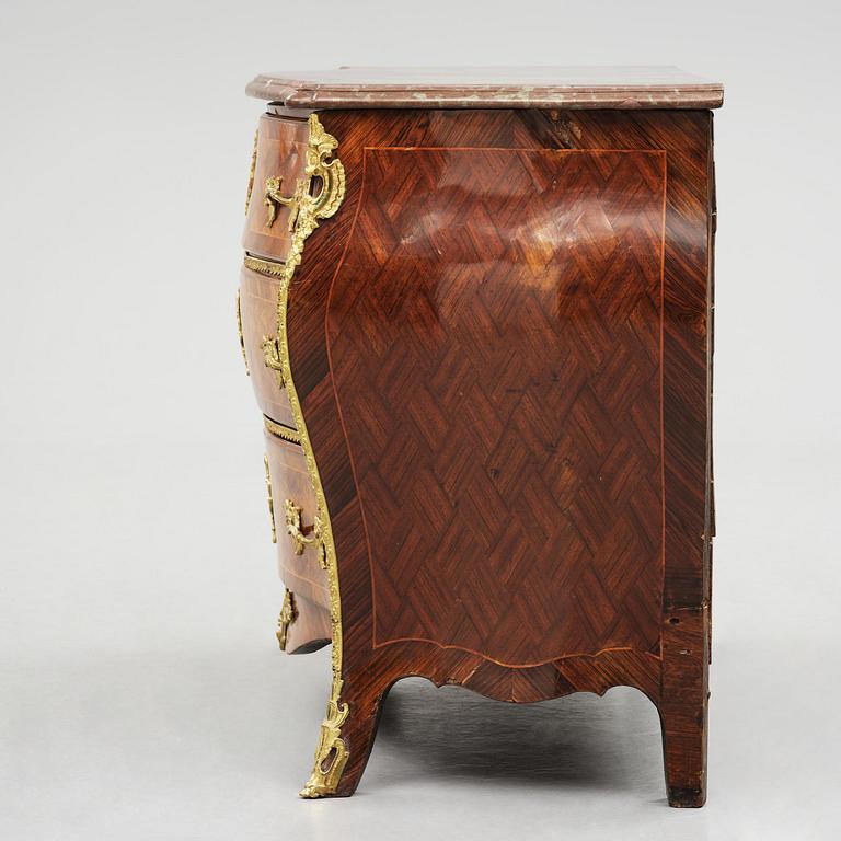 A parquetry and ormolu mounted rococo commode attributed to C. Tietze (master in Stockholm 1764.91).