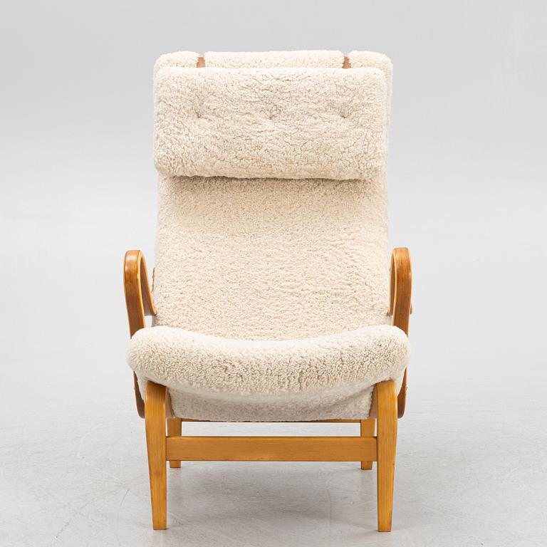 Bruno Mathsson, A 'Pernilla' easy chair with new sheepskin upholstery, by Bruno Mathsson for Firma Karl Mathsson.