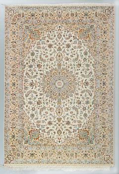 A silk rug from possibly from Kashan, 201 x 139 cm.