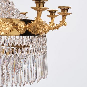 An Empire twelve-light chandelier, early 19th century.