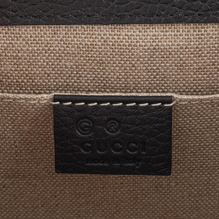 Gucci, a black leather 'Interlocking G' bag.