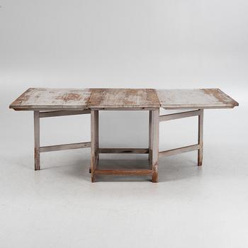 A painted gate leg table, 19th Century.