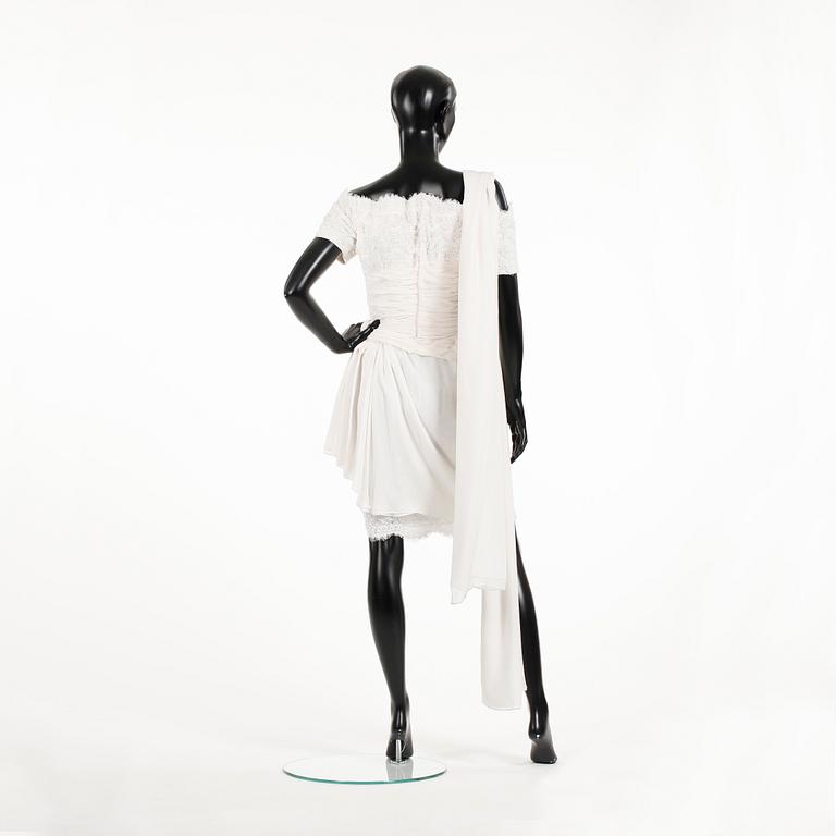 ODICINI COUTURE, a white silk cocktail dress.