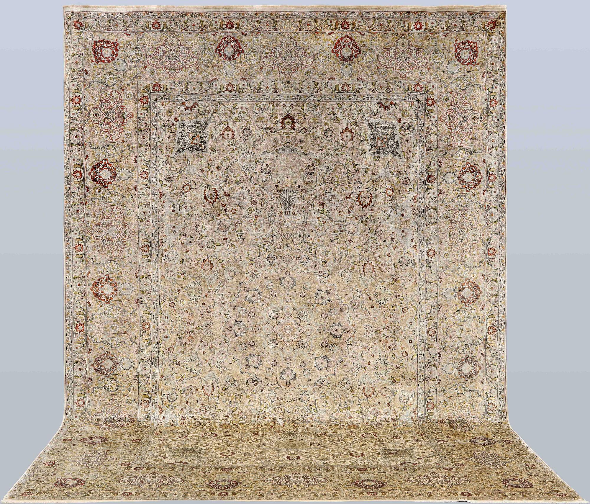 A oriental silk carpet, 350 x 247 cm.