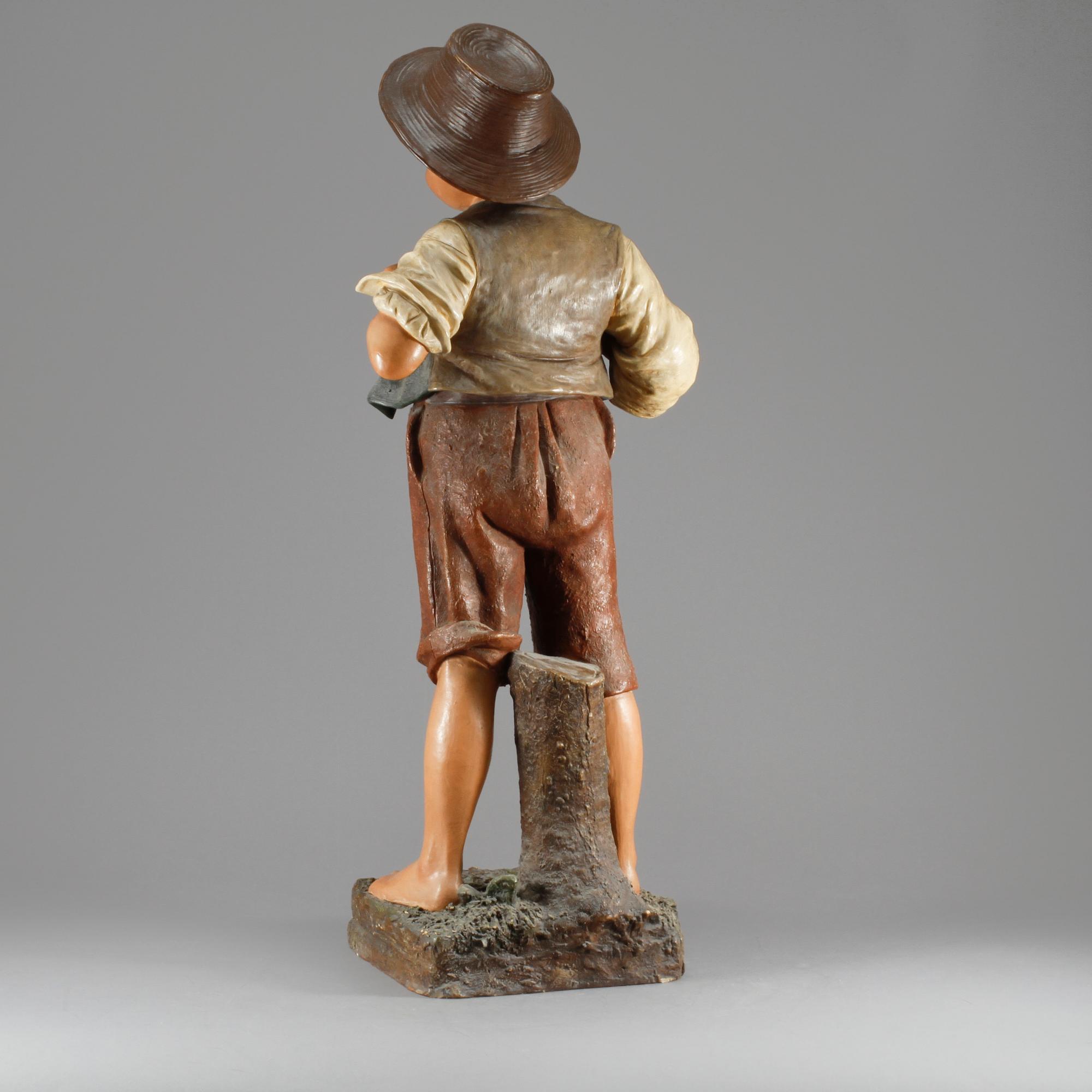 FIGURIN, målat stengods, 1900-talets första hälft.