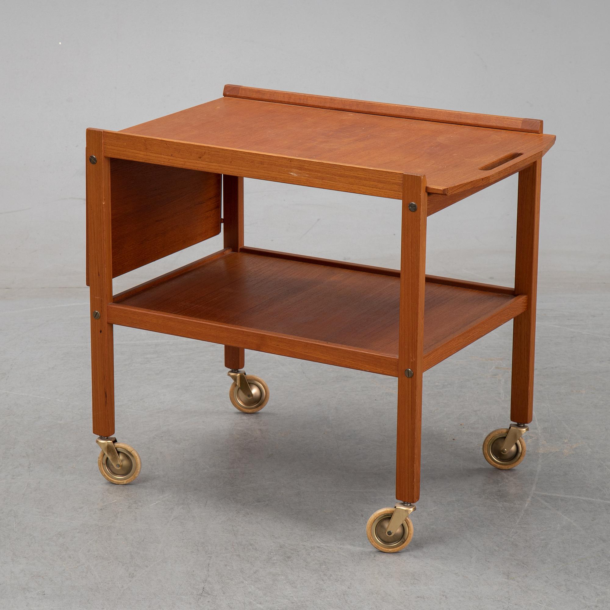 a mid 20th century teak serving trolley.