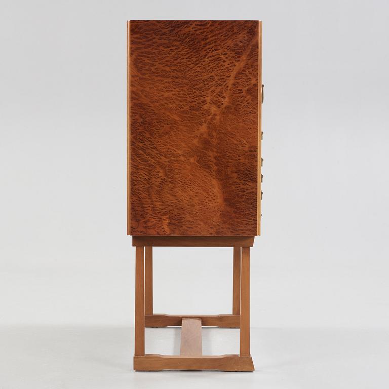 A Josef Frank burr wood, mahogany and walnut cabinet, Svenskt Tenn, model 881.