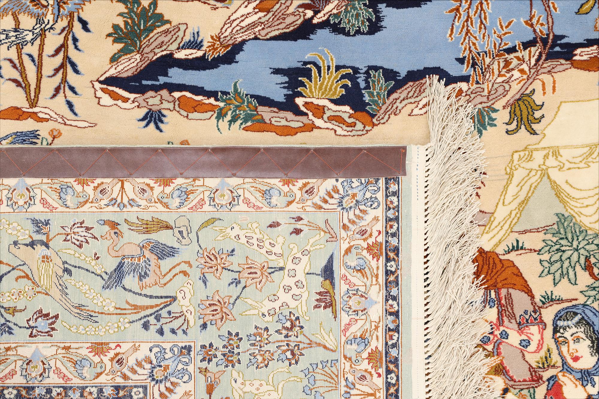 A Figural Isfahan carpet, part silk, 238 x 160 cm.