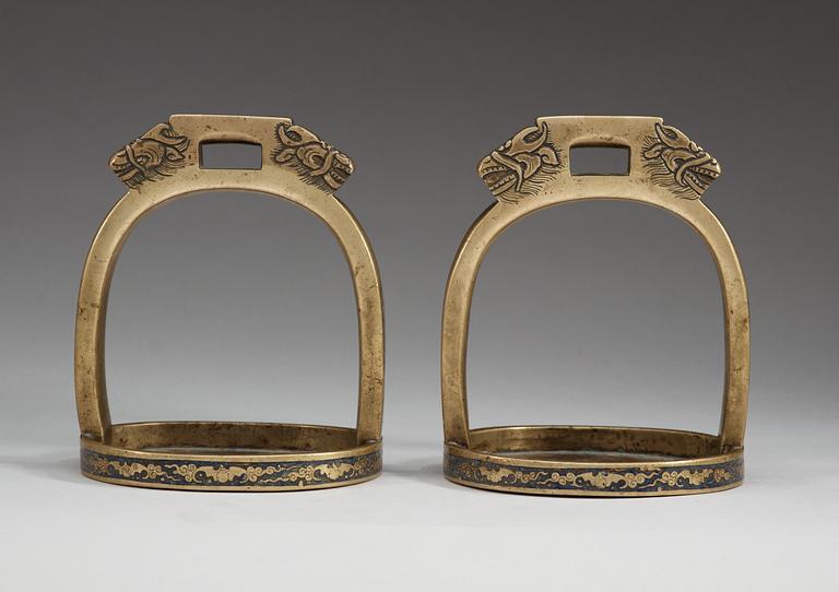 A pair of bronze stirrups with enamel, Qing dynasty, 19th Century.