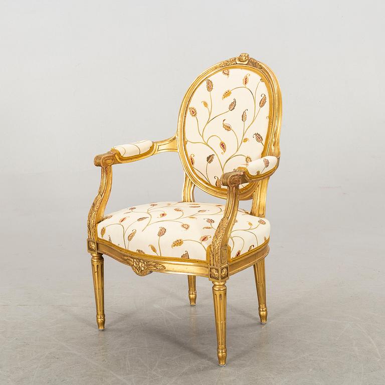 A Gustavian style armchair, 20th century.