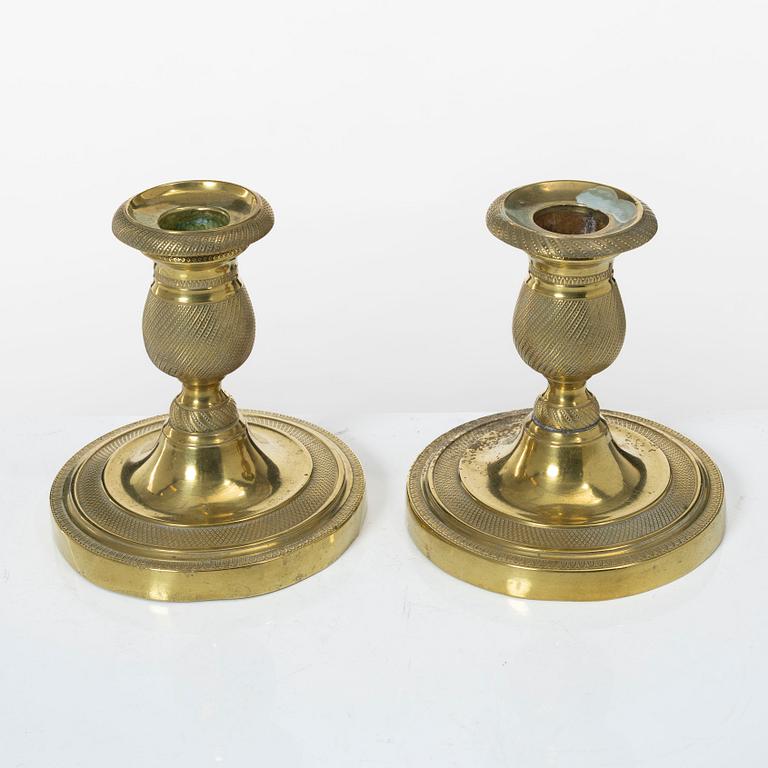 A pair of candle sticks, Empire, France, first half of the 19th century.