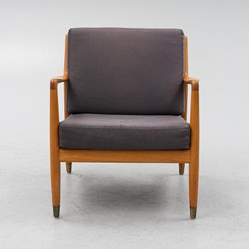 Folke Ohlsson, a beech 'USA-143' armchair, designed in 1953.