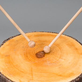 A drumming tree stump made by JoAnn Tan Studio for NK 2016.