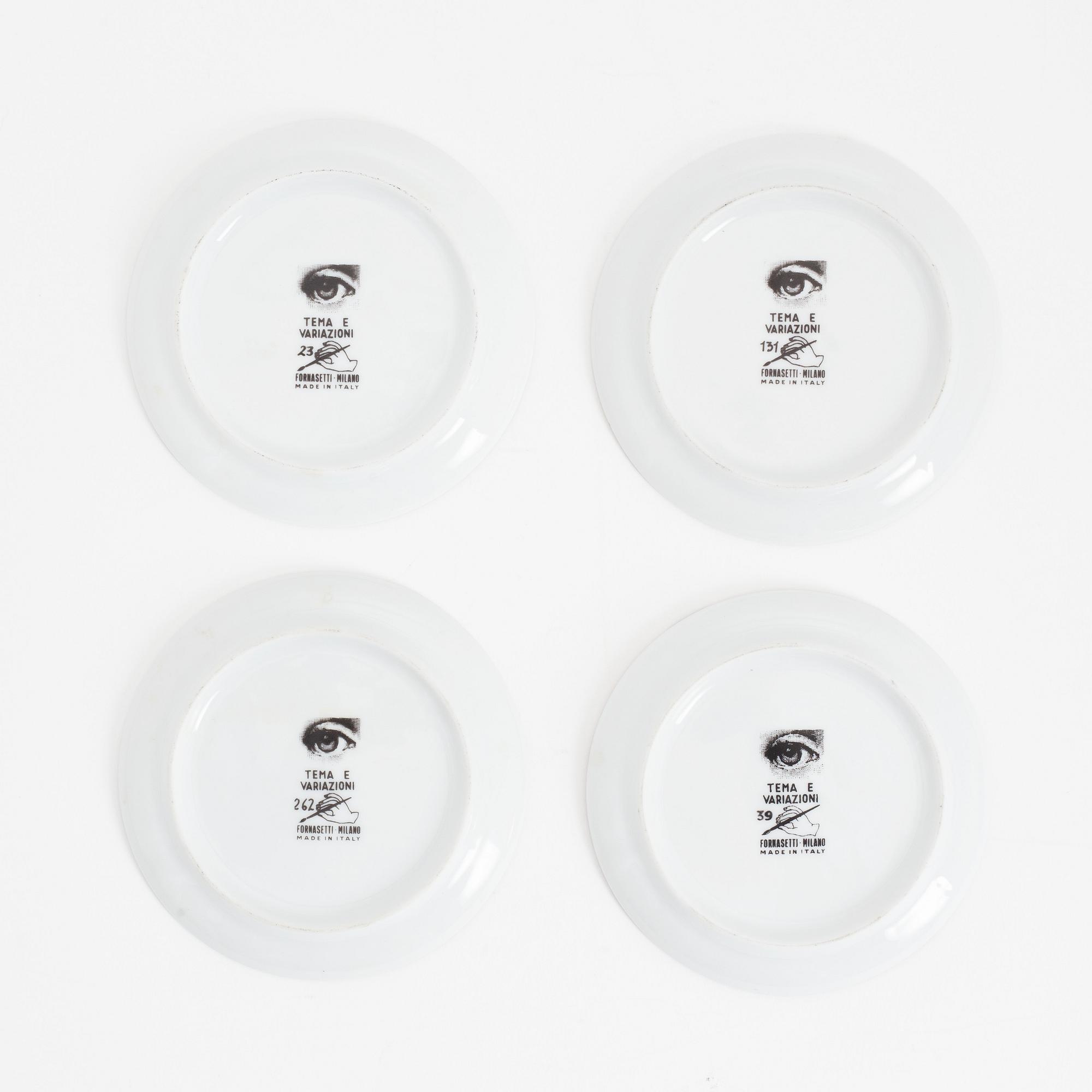 Fornasetti, four porcelain 'Tema e Variazioni' coasters, Italy.