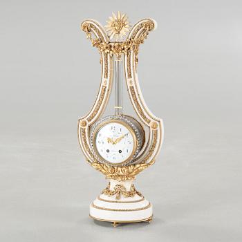 A table clock, dial marked "Gilles l'Ainé Paris", made around year 1900.
