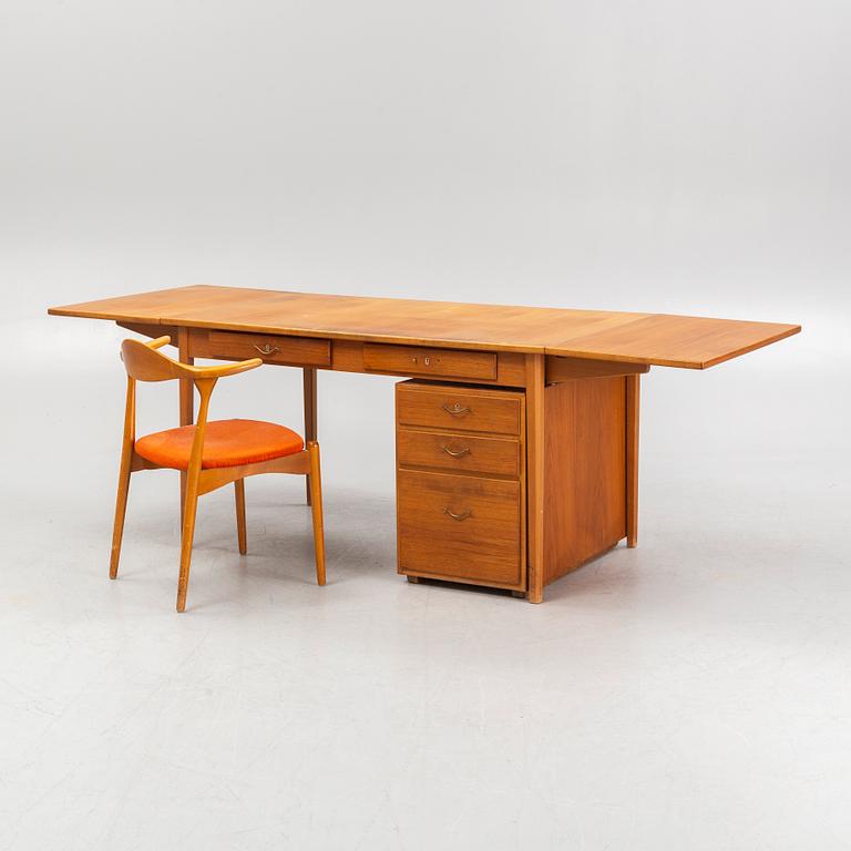 Folke Andersson, an 'Aristo' chair and a desk, Hugo Troeds, Bjärnum, mid 20th Century.