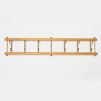 Klädhängare,  "Dekorativ", Skogslunds Metallgjuteri, Anderstorp, 1950/60-tal.