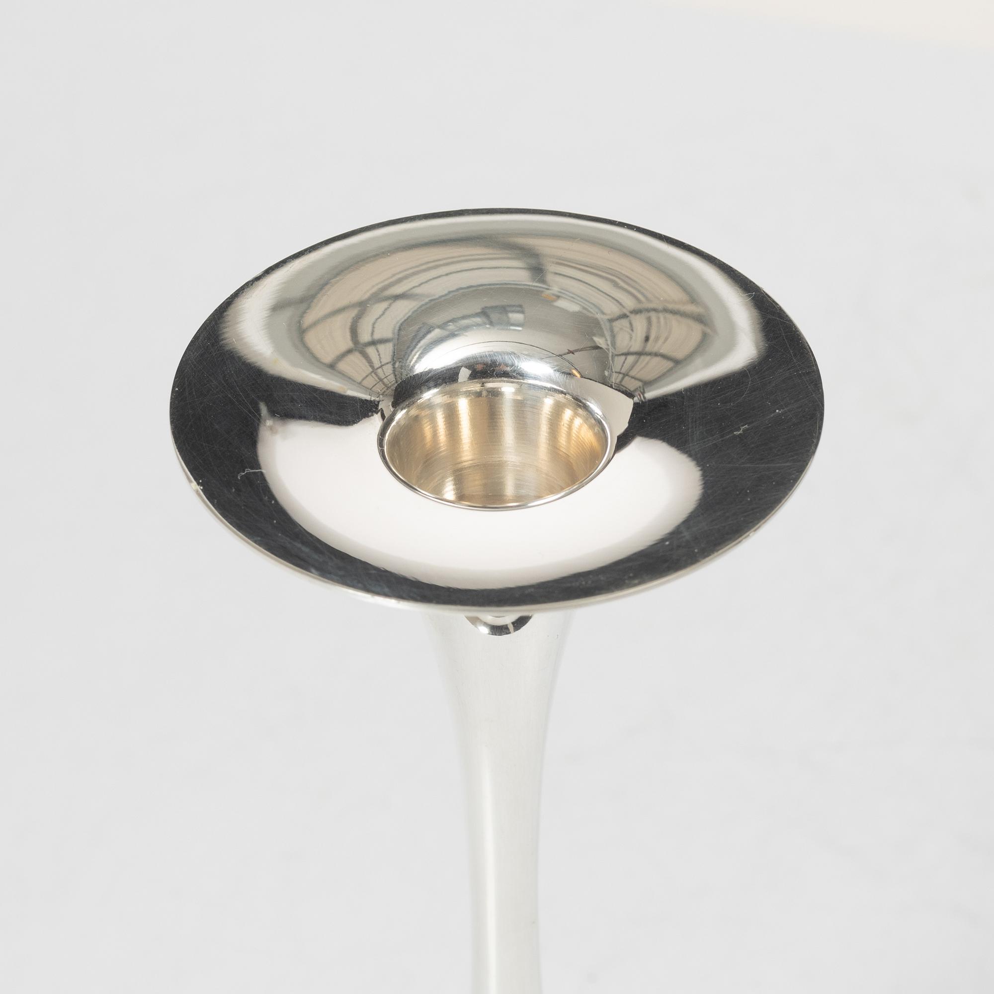 A pair of silver 'Trumpet' candlesticks, marks of Tapio Wirkkala, Kultakeskus, Hämeenlinna 1989 and 1992.