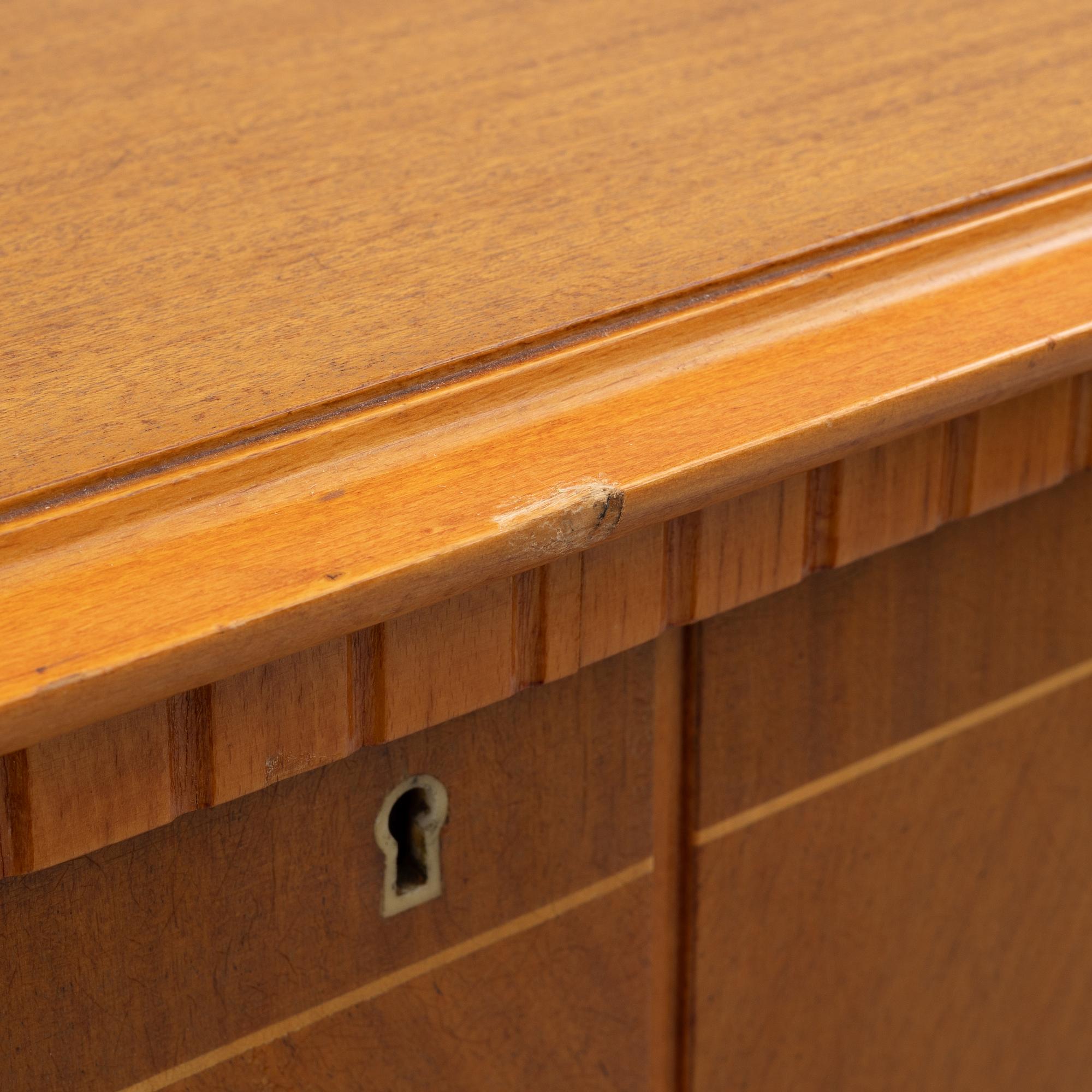 A cabinet, mid-20th Century.