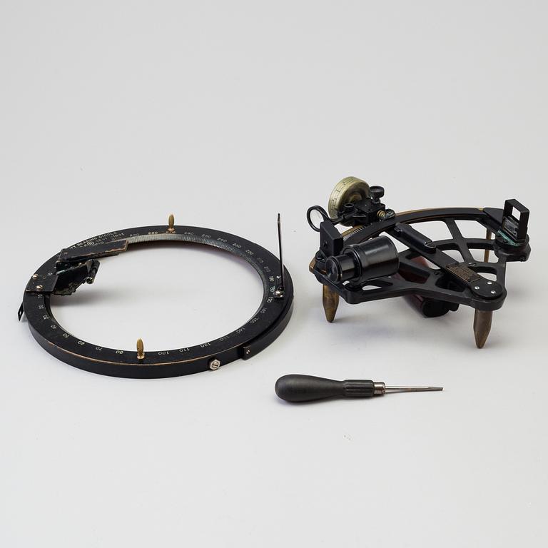 A 20th century Stadimeter and a bearing circle, both in cases. Marked U.S. Navy.
