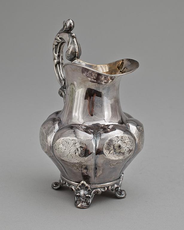 GRÄDDKANNA, silver, nyrokoko, Johan Olof Östlund, Gällivare 1865. Vikt ca 168 g.