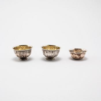 Three Swedish 18th century parcel-gilt silver tumblers, two marked Petter Röding, Varberg (1741-1763), one unmarked.