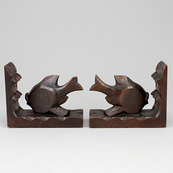 A pair of dark wood book ends, first half of the 20th century.