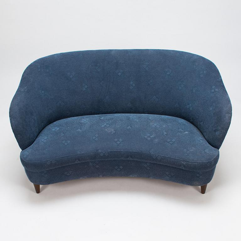 A mid-20th-century sofa.