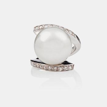1365. A cultured South sea pearl and brilliant-cut diamond ring. Total carat weight of diamonds circa 1.50 cts.