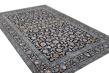 A carpet, Kashan, c. 495 x 305 cm.