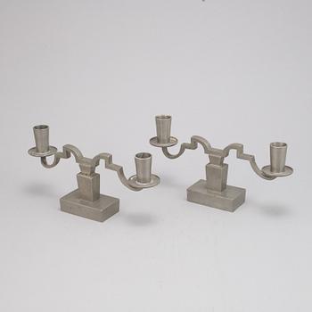 Nils Fougstedt, A pair of pewter candle sticks for Firma Svenskt Tenn, 1933.