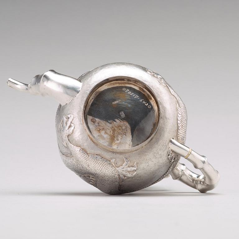 A Chinese four piece silver tea set, Luen Wo, Shanghai, 1875-1925.